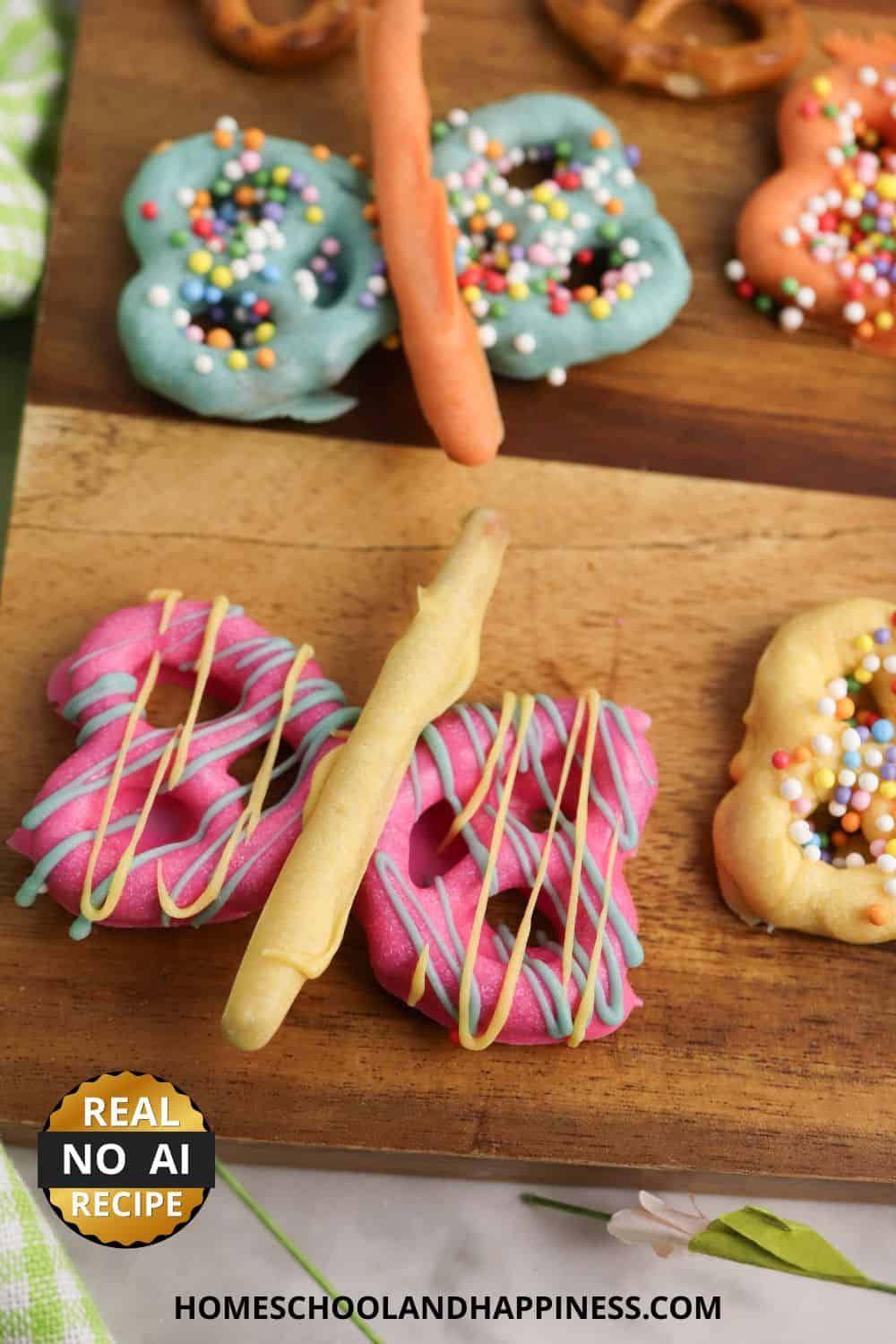 Decorated chocolate covered butterfly pretzels for kids.