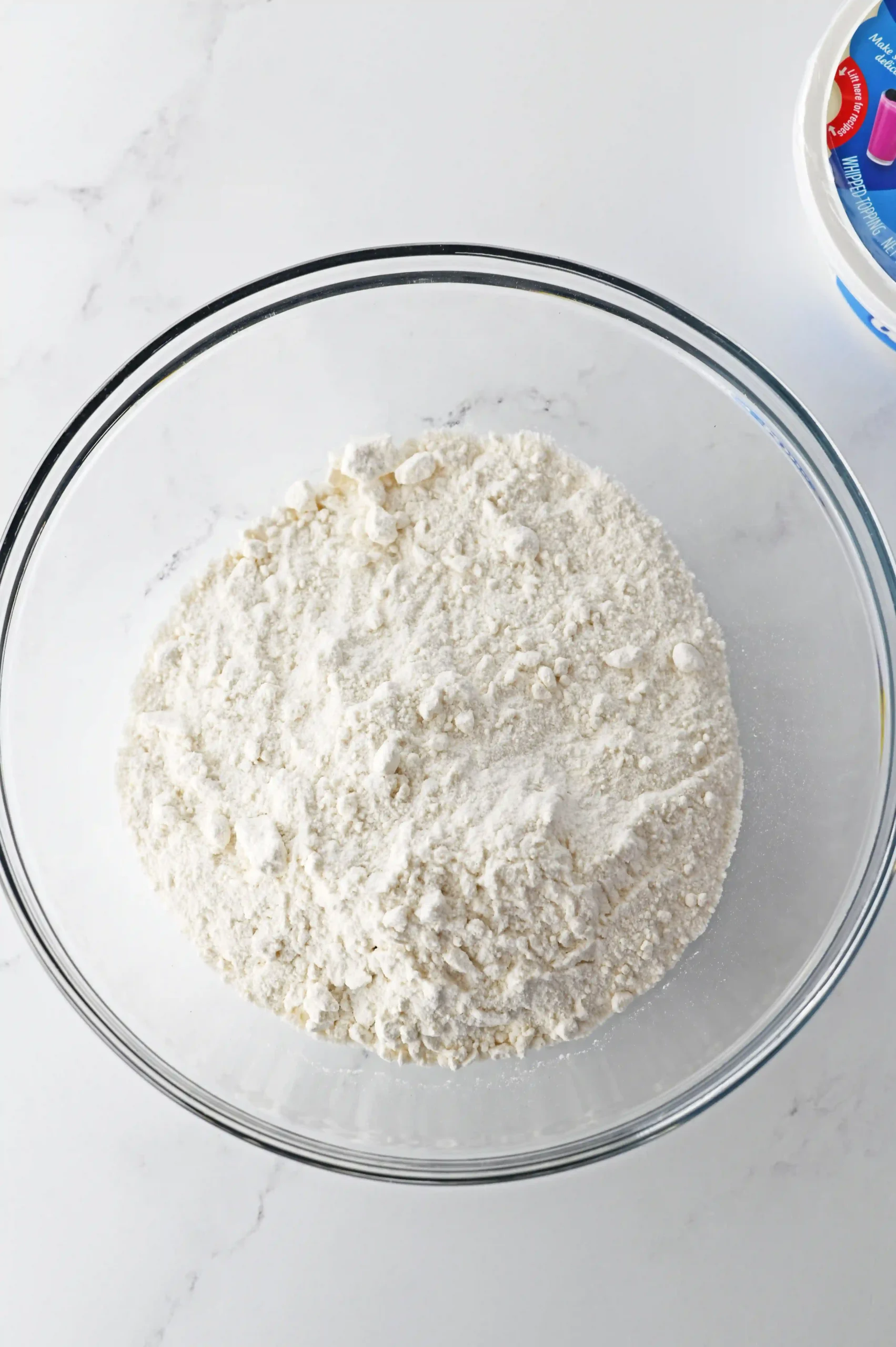 white cake mix in a glass bowl