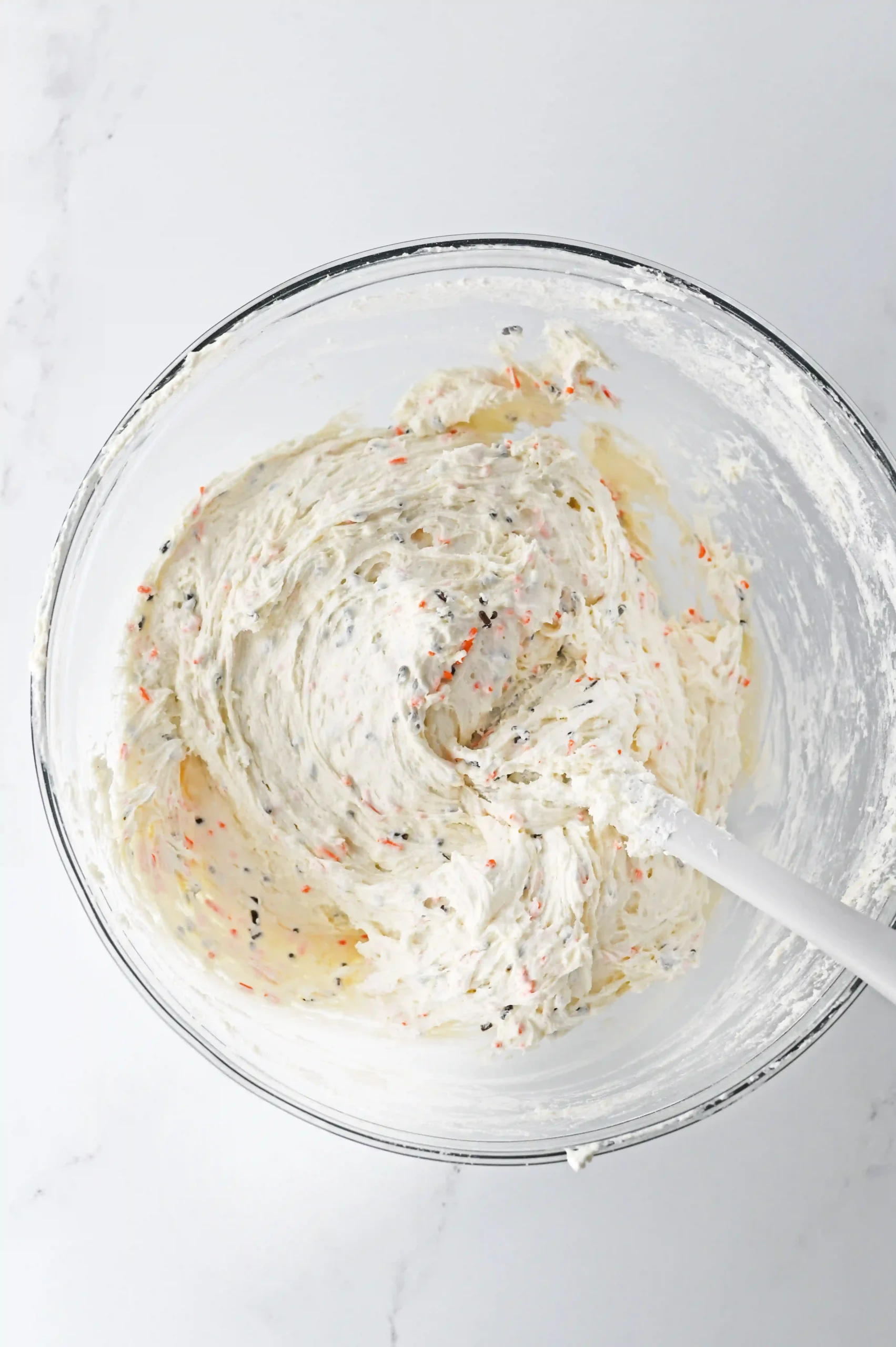 a halloween funfetti dip with sprinkles in a bowl