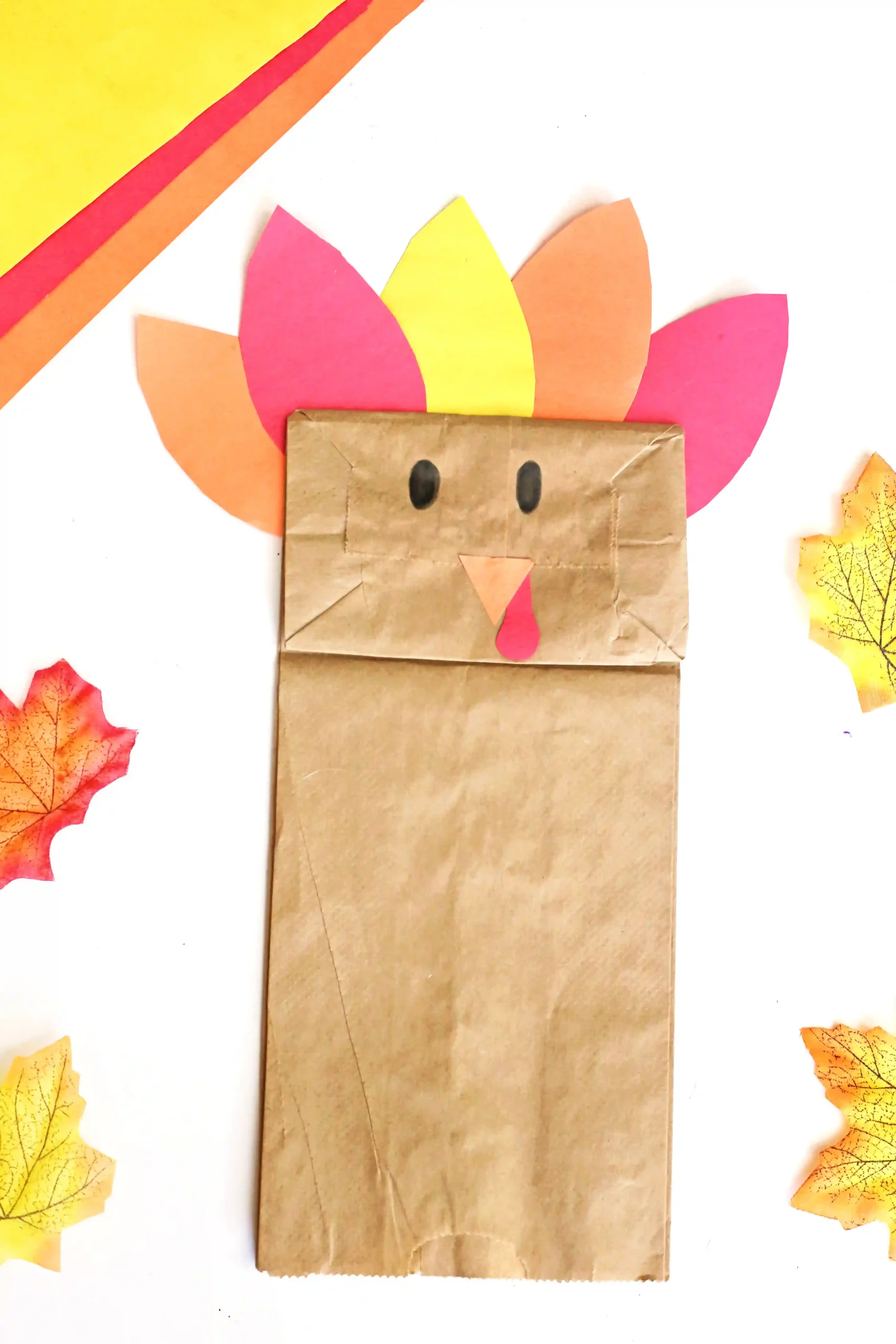 a paper bag decorated to look like a turkey